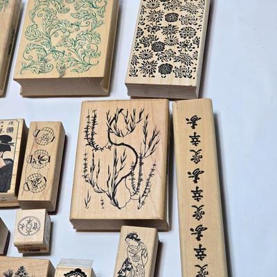 Stamps mounted on wood blocks - mostly Asian themed - bamboo - letters- and more