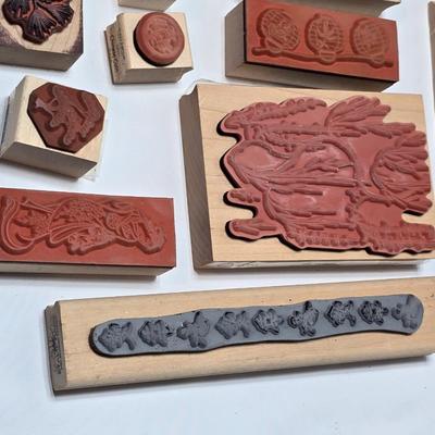 Stamps mounted on wood blocks - mostly Asian themed - bamboo - letters- and more