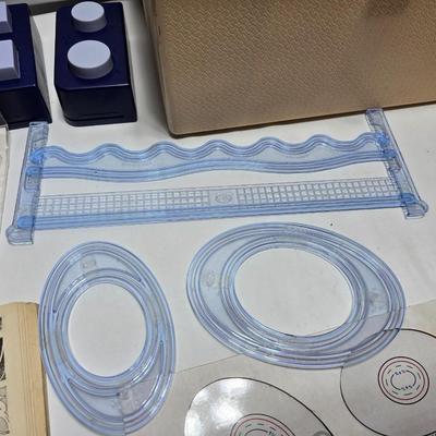 Box of crafting supplies - stencils - die cuts - scissors and more