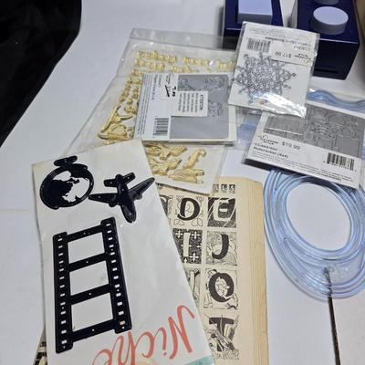 Box of crafting supplies - stencils - die cuts - scissors and more