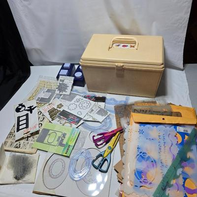 Box of crafting supplies - stencils - die cuts - scissors and more