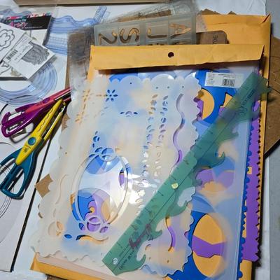 Box of crafting supplies - stencils - die cuts - scissors and more