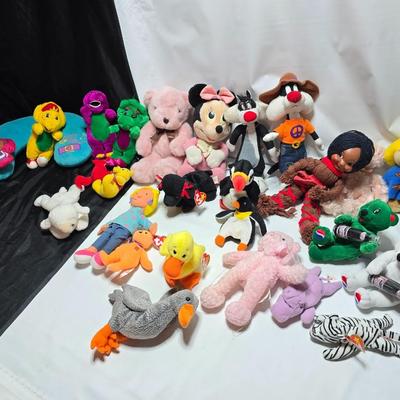 Huge assortment of plush characters - Disney - Looney toons - Barney % friends - animals - Ty and more