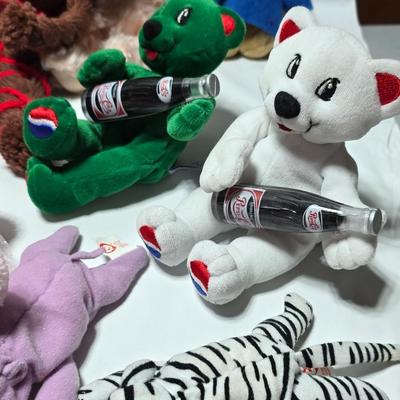 Huge assortment of plush characters - Disney - Looney toons - Barney % friends - animals - Ty and more