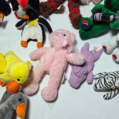 Huge assortment of plush characters - Disney - Looney toons - Barney % friends - animals - Ty and more