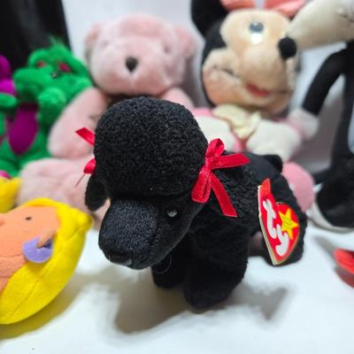 Huge assortment of plush characters - Disney - Looney toons - Barney % friends - animals - Ty and more