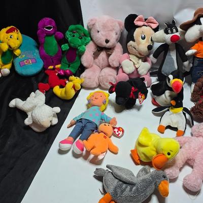 Huge assortment of plush characters - Disney - Looney toons - Barney % friends - animals - Ty and more