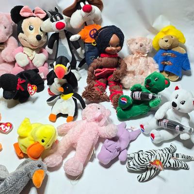 Huge assortment of plush characters - Disney - Looney toons - Barney % friends - animals - Ty and more