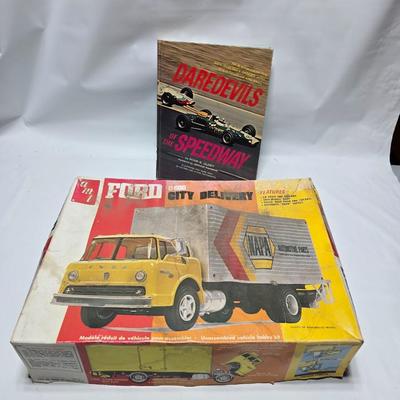 Vintage AMT Ford C600 City Delivery Hertz 1/25 Scale Model Kit T548 appears complete with a Darefevil book