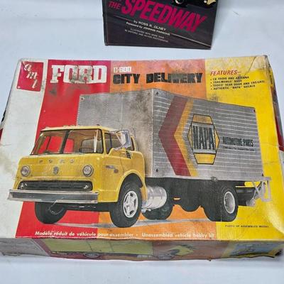 Vintage AMT Ford C600 City Delivery Hertz 1/25 Scale Model Kit T548 appears complete with a Darefevil book