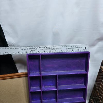 Small trinket shelves, picture frames, and a wall clock