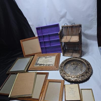 Small trinket shelves, picture frames, and a wall clock