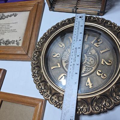 Small trinket shelves, picture frames, and a wall clock