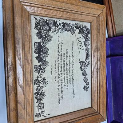 Small trinket shelves, picture frames, and a wall clock