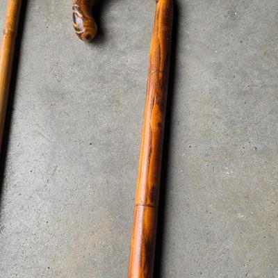 Two vintage wooden walking canes