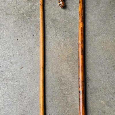 Two vintage wooden walking canes