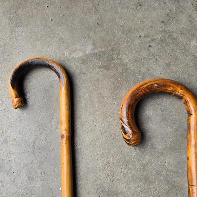 Two vintage wooden walking canes