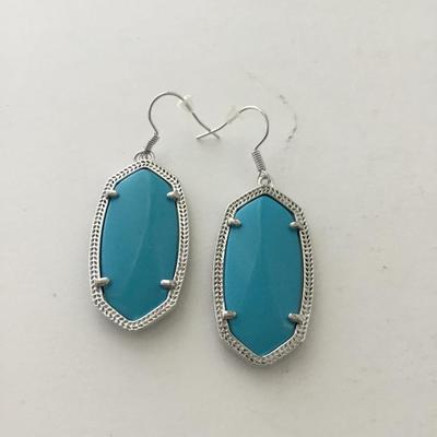 Silver tone light blue fashion earrings