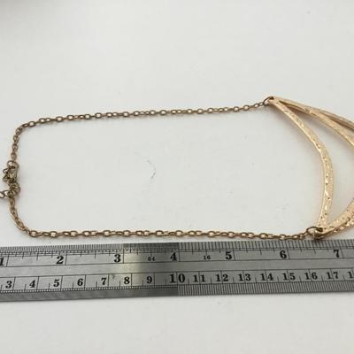 Gold tone fashion necklace
