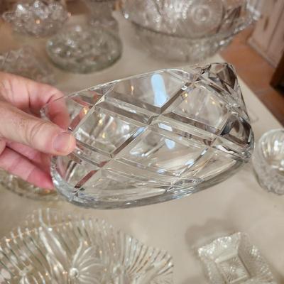 Table lot of Clear Glass Crystal Bowls Candle Holders ,Glasses, Waterford , Reed & Barton Drinking Glasses ,Queen Mary 2 , and others