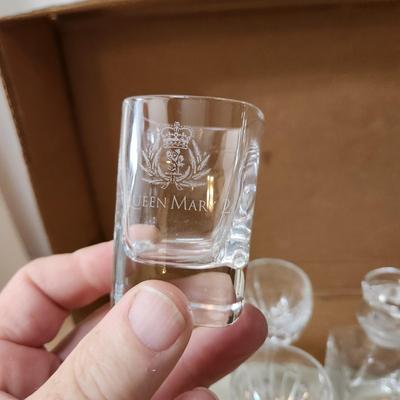 Table lot of Clear Glass Crystal Bowls Candle Holders ,Glasses, Waterford , Reed & Barton Drinking Glasses ,Queen Mary 2 , and others