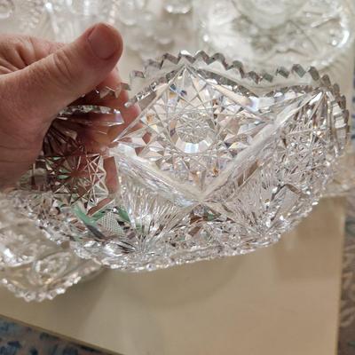 Table lot of Clear Glass Crystal Bowls Candle Holders ,Glasses, Waterford , Reed & Barton Drinking Glasses ,Queen Mary 2 , and others