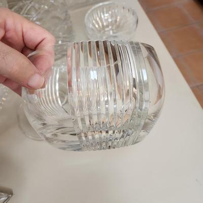 Table lot of Clear Glass Crystal Bowls Candle Holders ,Glasses, Waterford , Reed & Barton Drinking Glasses ,Queen Mary 2 , and others