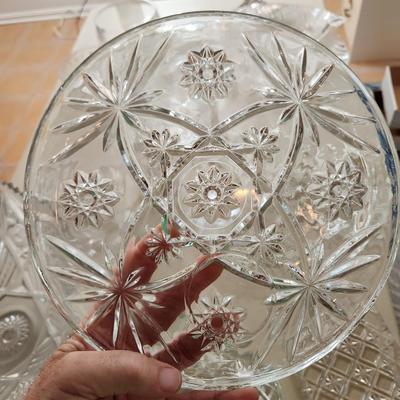 Table lot of Clear Glass Crystal Bowls Candle Holders ,Glasses, Waterford , Reed & Barton Drinking Glasses ,Queen Mary 2 , and others