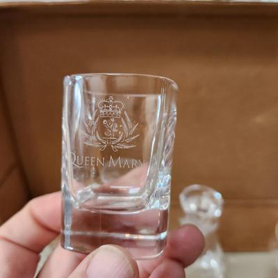 Table lot of Clear Glass Crystal Bowls Candle Holders ,Glasses, Waterford , Reed & Barton Drinking Glasses ,Queen Mary 2 , and others