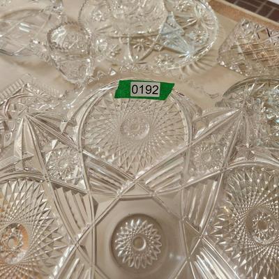 Table lot of Clear Glass Crystal Bowls Candle Holders ,Glasses, Waterford , Reed & Barton Drinking Glasses ,Queen Mary 2 , and others