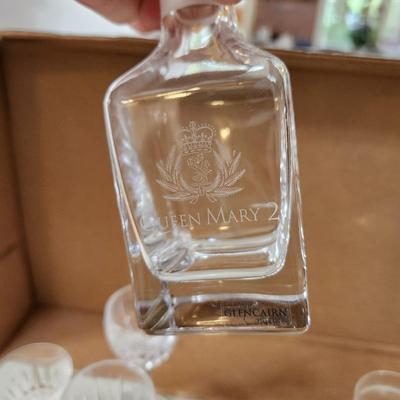 Table lot of Clear Glass Crystal Bowls Candle Holders ,Glasses, Waterford , Reed & Barton Drinking Glasses ,Queen Mary 2 , and others