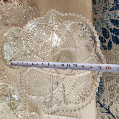 Table lot of Clear Glass Crystal Bowls Candle Holders ,Glasses, Waterford , Reed & Barton Drinking Glasses ,Queen Mary 2 , and others