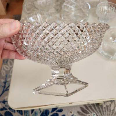 Table lot of Clear Glass Crystal Bowls Candle Holders ,Glasses, Waterford , Reed & Barton Drinking Glasses ,Queen Mary 2 , and others