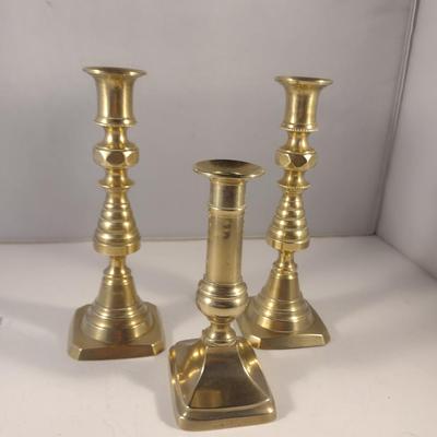 Sale Photo Thumbnail #350: Brass Candle Stick Holders.  Matching pair with beehive design is stamped 'England'.