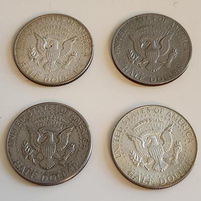 Four Kennedy Half Dollars