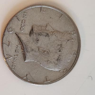 Four Kennedy Half Dollars