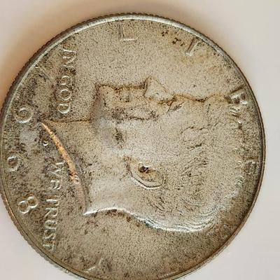 Four Kennedy Half Dollars