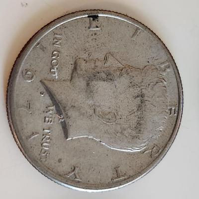 Four Kennedy Half Dollars