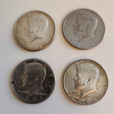 Four Kennedy Half Dollars