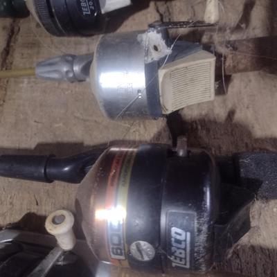 Set of Seven Fishing Poles with Closed Face Reels Zebco and Other