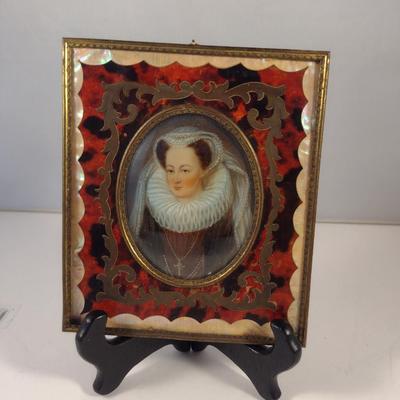 Sale Photo Thumbnail #417: Antique Miniature Portrait in Boulle Work Frame with Convex Bubble Glass and Mother of Pearl Inlay- Approx 4 3/4" x 5 5/8".  Image is possibly of Mary Stuart, Queen of Scots.  Frame stand not included.