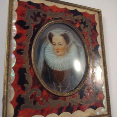 Sale Photo Thumbnail #422: Antique Miniature Portrait in Boulle Work Frame with Convex Bubble Glass and Mother of Pearl Inlay- Approx 4 3/4" x 5 5/8".  Image is possibly of Mary Stuart, Queen of Scots.  Frame stand not included.