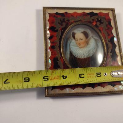 Sale Photo Thumbnail #420: Antique Miniature Portrait in Boulle Work Frame with Convex Bubble Glass and Mother of Pearl Inlay- Approx 4 3/4" x 5 5/8".  Image is possibly of Mary Stuart, Queen of Scots.  Frame stand not included.