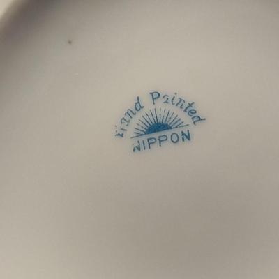 Sale Photo Thumbnail #476: Vintage Hand Painted Nippon Condiment Set- Seven Pieces.  Cup has chipping at rim- please see all pictures for condition.