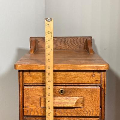LOT 63: Vintage Wooden 4-Drawer Accent Table