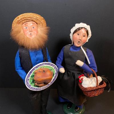LOT 78: Byers' Choice Ltd. The Carolers Signed by Joyce Byers - Amish Man Holding Turkey, Amish Woman Holding Basket with Hen and Box