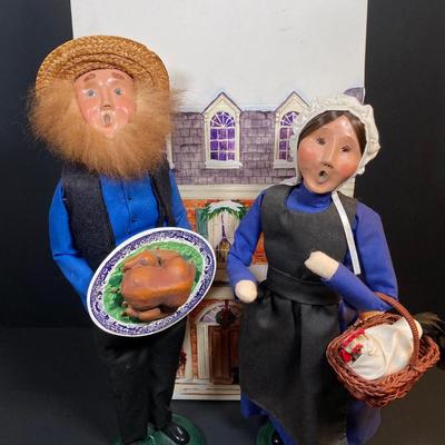 LOT 78: Byers' Choice Ltd. The Carolers Signed by Joyce Byers - Amish Man Holding Turkey, Amish Woman Holding Basket with Hen and Box