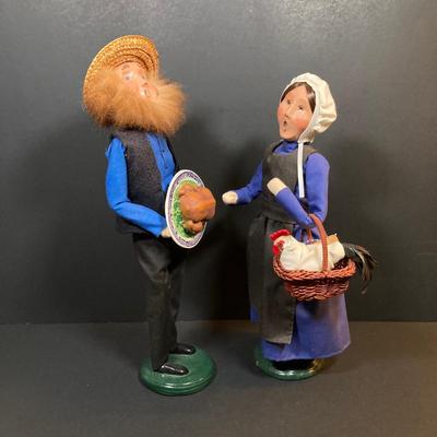 LOT 78: Byers' Choice Ltd. The Carolers Signed by Joyce Byers - Amish Man Holding Turkey, Amish Woman Holding Basket with Hen and Box