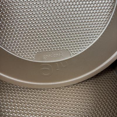 LOT 95: Bakers Delight: Pamper Chef Cookie Press, Longaberger Yellow Pie Plate, Spring Form Pan, Autum Cake-lite Pan, Wilton Round Pans,...