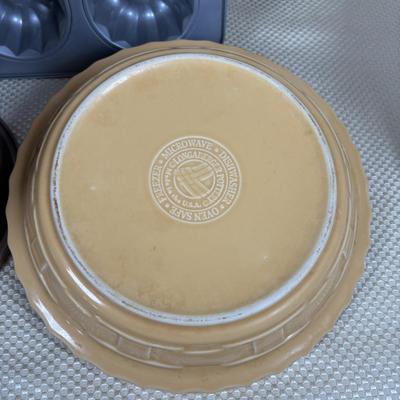 LOT 95: Bakers Delight: Pamper Chef Cookie Press, Longaberger Yellow Pie Plate, Spring Form Pan, Autum Cake-lite Pan, Wilton Round Pans,...